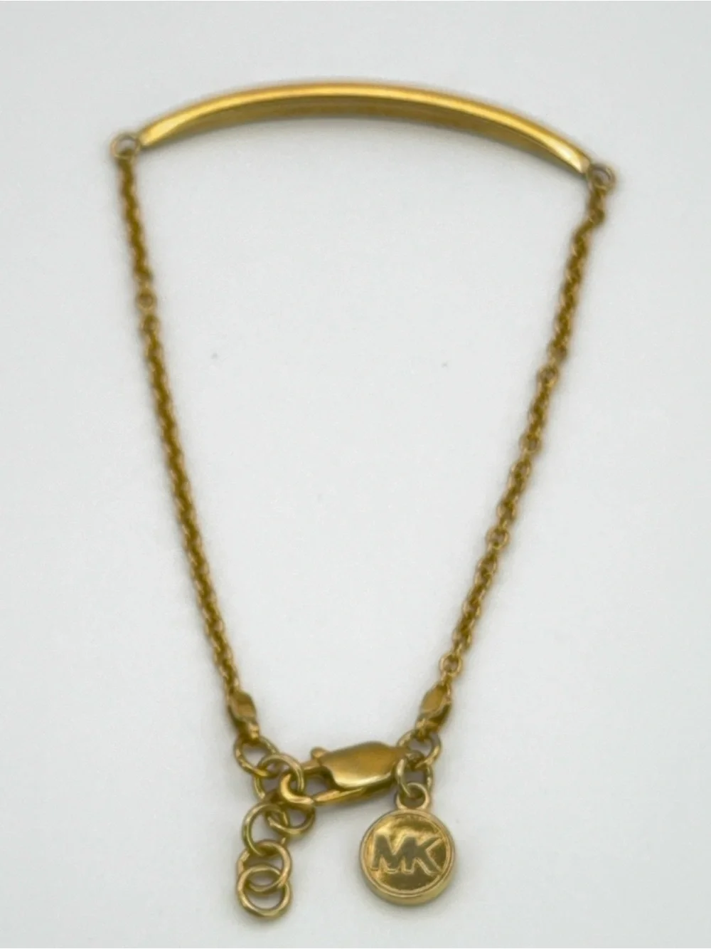 Gold-tone MK Michael Kors pavé curved bar Bracelet